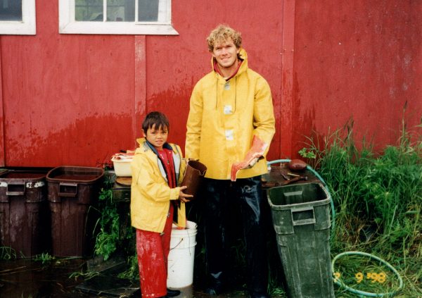 boy and man holding filet