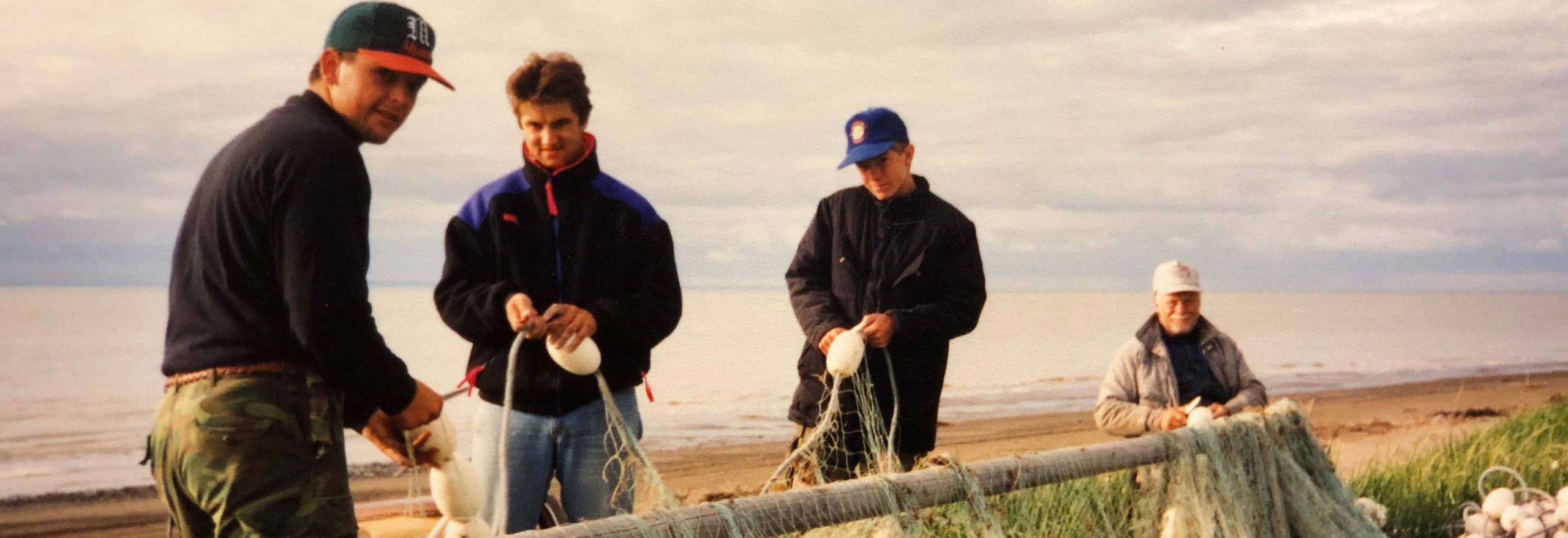 family cutting fishing net